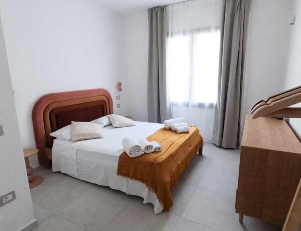 Camera matrimoniale dell’appartamento A Domus con letto matrimoniale