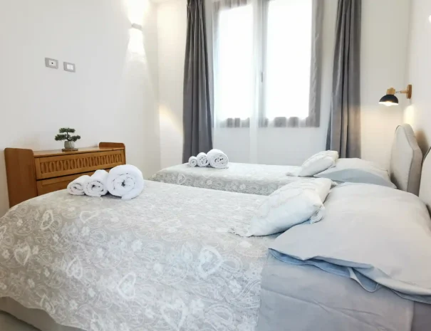 letti-singoli-vista -laterale-casa-vacanza-domus-soli